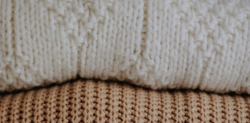 close up of colorful sweaters